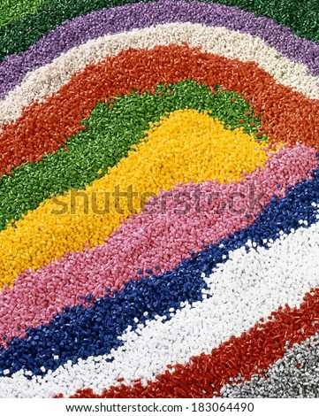Colorful industrial plastic granules background
