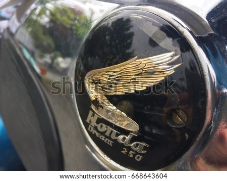 Berlin, Germany - May 13, 2017: Honda Dream 250 motorcycle logo. The Honda Dream CB250 was a standard motorcycle made by Honda in 1968 and 1969 and sold only in Japan