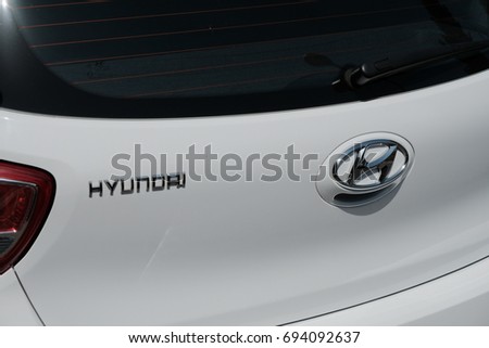 Rome, Italy - August 9, 2017: Hyundai logo on white car. The Hyundai Motor Company is a South Korean multinational automotive manufacturer