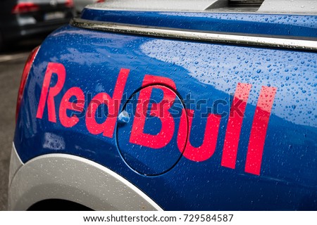 Berlin, Germany - July 10, 2017: Red Bull logo. Red Bull is an energy drink sold by Austrian company Red Bull GmbH, created in 1987. It has the highest market share of any energy drink in the world