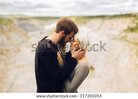 https://thumb1.shutterstock.com/display_pic_with_logo/2978116/317205014/stock-photo-lovely-couple-romantic-beautiful-woman-and-handsome-man-bearded-boy-and-blond-girl-outdoors-together-317205014.jpg