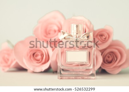 Download Perfume Bottle Front Pink Roses Stock Photo 526532299 ... Yellowimages Mockups