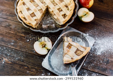 Traditional Open Vegetarian Apple Pie On Wooden Table In Rustic Style Traditional Open Vegetarian Apple Pie On Wooden Table In Rustic Style