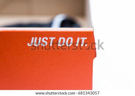 Khonkaen, Thailand - July 21, 2017 : Nike wording "just do it" on orange box paper - illustrative editorial