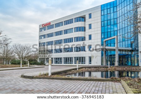 KREFELD / GERMANY - FEBRUARY 15 2016 : Canon office building under the clouds