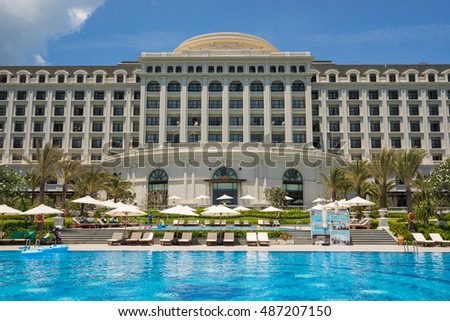 Nha Trang, Vietnam - May 14 2016 : Swimming pool of five star Vinpearl resort view at Nha Trang, Vietnam. Nha Trang a popular destination for international tourists with beach and resort