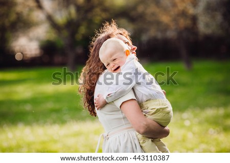 Mother comforting a crying baby