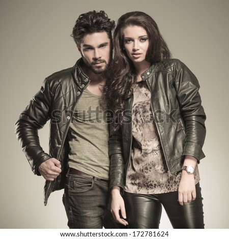 https://thumb1.shutterstock.com/display_pic_with_logo/305215/172781624/stock-photo-young-couple-posing-in-studio-dressed-in-leather-jackets-sepia-picture-172781624.jpg