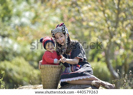 Hmong girl with daughter.