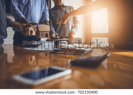 Business meetings of real estate brokers and company presidents to select a model to build a housing estate in writing and presenting to state organizations.