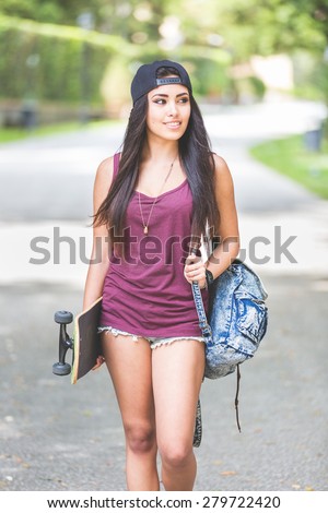 https://thumb1.shutterstock.com/display_pic_with_logo/308011/279722420/stock-photo-beautiful-girl-walking-at-park-holding-a-skateboard-she-is-half-caucasian-and-half-filipina-she-279722420.jpg
