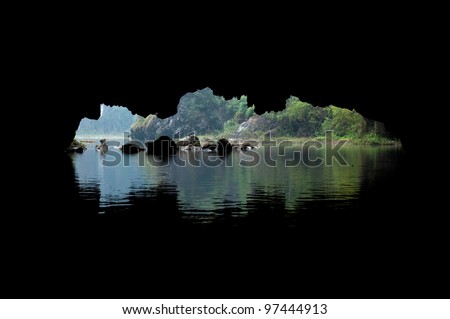 Cave opening as seen from within, on the river at Tam Coc scenic spot, Ninh Binh, Vietnam.
