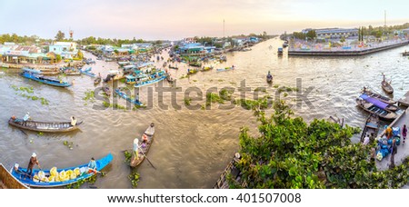 Soc Trang, Vietnam - February 3rd, 2016: Panorama floating market wetland busiest night with boats agricultural products to trade in morning preparing for New Year in wetland Soc Trang, Vietnam