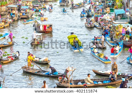 Soc Trang, Vietnam - February 3rd, 2016: Boat carrying daisies trade on river at the end of year around busiest boats agricultural trade makes scene more beautiful countryside in Soc Trang, Vietnam