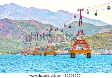 Nha Trang, Vietnam - July 29th, 2016: Cable car to Vinpearl amusement park in the morning sunshine to attract tourists to the weekend relaxing in Nha Trang, Vietnam