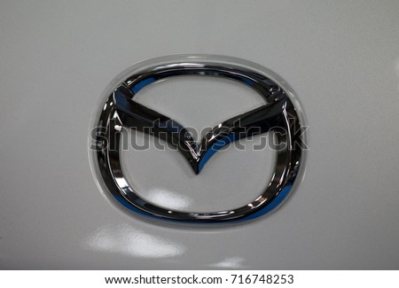 CRACOW, POLAND - MAY 20, 2017: Mazda metallic logo closeup on Mazda car displayed at MOTO SHOW in Cracow Poland. Exhibitors present most interesting aspects of the automotive industry