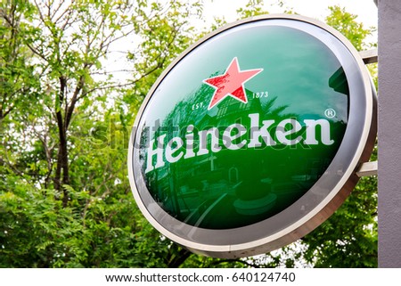 Pickadaily, Bangkok, Thailand. - May 14, 2017 : Heineken logo hang on the wall building.