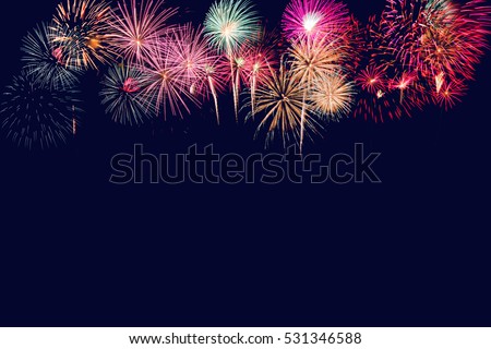 Brightly Colorful Fireworks on twilight background