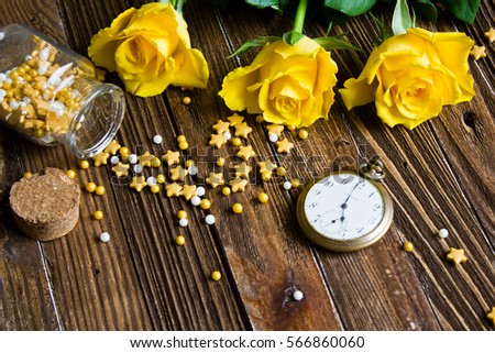 The bouquet of beautiful fresh yellow roses lies on a wooden table.
Card template by St. Valentine's Day or the international Women's Day.