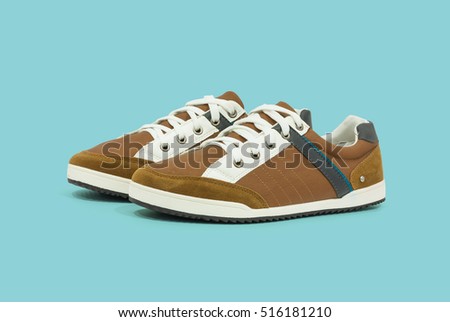 Men's casual shoes on plain background