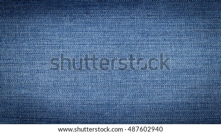Denim Jeans Texture In Close Up View With Copy Space For Vintage Background Or Wallpaper Denim Jeans Texture In Close Up View With Copy Space For Vintage Background Or Wallpaper