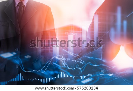 Double exposure businessman and stock market or forex graph suitable for financial investment concept. Economy trends background for business idea and all art work design. Abstract finance background.
