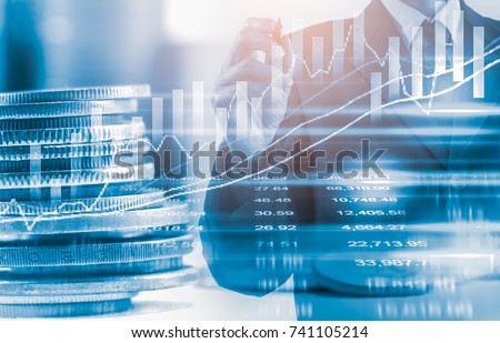 Double exposure businessman and stock market or forex graph suitable for financial investment concept. Economy trends background for business idea and all art work design. Abstract finance background.