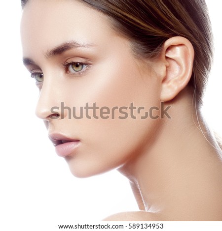 Beautiful young caucasian girl with natural makeup profile. Woman portrait.