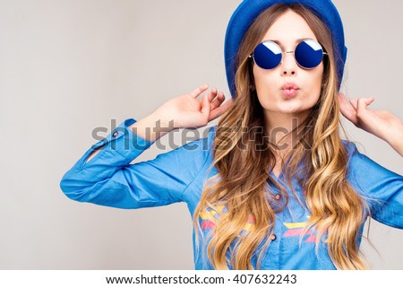 Cool hipster student woman wearing eyewear glasses . Caucasian female university student looking at camera smiling happy.
