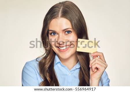 smiling business woman presenting gold credit card. isolated portrait.