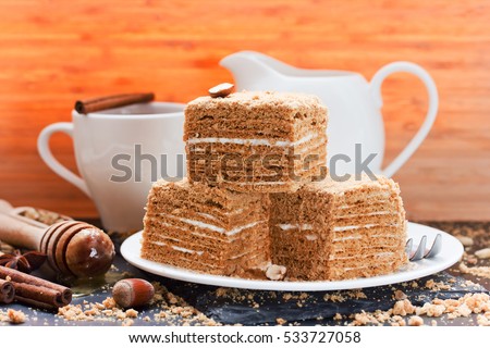 Slice Of Layered Honey Cake On Plate Slice Of Layered Honey Cake On Plate