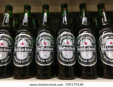 PENANG, MALAYSIA - AUGUST 24, 2017 : Heineken beer bottles beverage on store shelf. Heineken is a Dutch brewing company, founded in 1864 by Gerard Adriaan Heineken in Amsterdam.