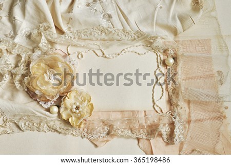 Fabric Flowers And Pearls On The Background In A Vintage Style Fabric Flowers And Pearls On The Background In A Vintage Style