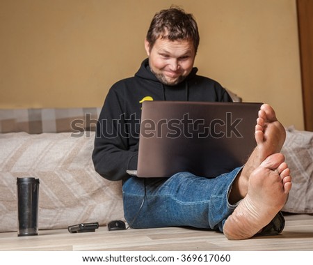 Happy Barefoot Man Working On His Stock Photo Royalty 