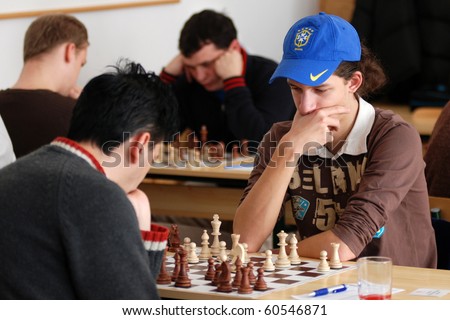 KAPOSVAR, HUNGARY - FEBRUARY 18: Unidentified chess player concentrates at the Hungarian National Championship I/B. chess competition between Kaposvar and Decs February 18, 2007 in Kaposvar, Hungary.