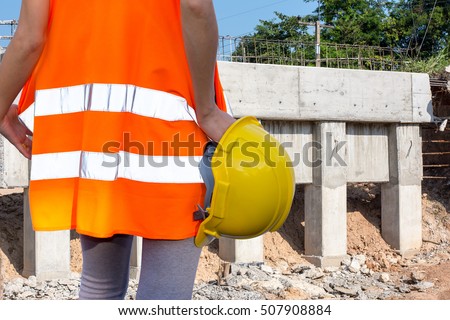 Woman engineer in Bridge construction.