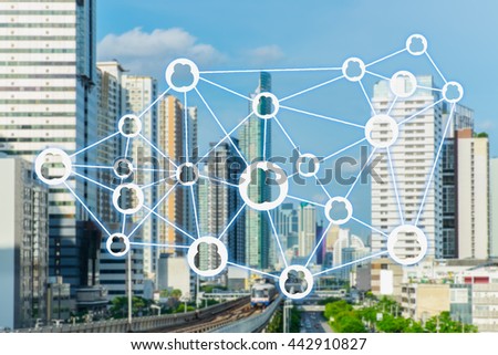 The sharing economy concept. Wireless connection against city infrastructure background.