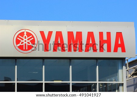 Samara, Russia - August 30, 2016. the sign and logo manufacturer YAMAHA over the entrance to the service center