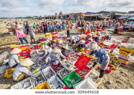 VUNG TAU, VIETNAM - AUG 23,2015: Fishermen on beach at the Fishing Village Long Hai, Vietnam.