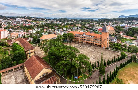 DA LAT, VIETNAM, NOV 20, 2016: University landscape in the city of Da Lat , highland Da Lat city fog in the morning ( view from drone )