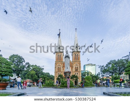 HO CHI MINH, VIETNAM - DEC 15, 2014: Saigon Notre-Dame Cathedral Basilica on blue sky background in Ho Chi Minh city, Vietnam. Ho Chi Minh is a popular tourist destination of Asia.
