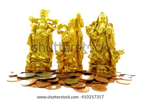 Concept of blessings,prosperity and longevity of Golden statue of Chinese deities called Fu Lu Shou,Three Stars God with many thai coins on white background:select focus with shallow depth of field.