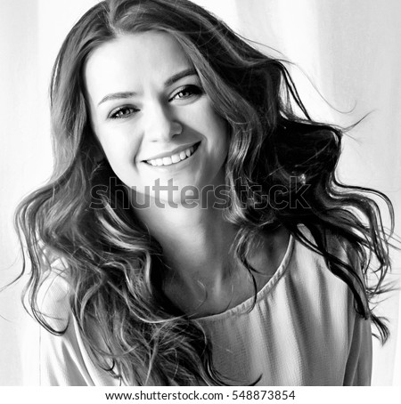 https://thumb1.shutterstock.com/display_pic_with_logo/348784/548873854/stock-photo-black-and-white-portrait-of-a-young-beautiful-woman-woman-in-black-white-black-and-white-548873854.jpg