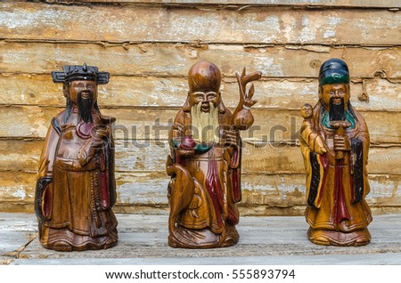Wood Statue of Chinese Gods, of Fortune (Fu,Hok), of Prosperity (Lu,Lok), and of Longevity (Shou,Siu), Select Focus. (Public)