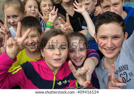 Outdoor games on the field.The children's faces in selfies.Children's camp"Birch" Russia, Yaroslavl 17.06.2015