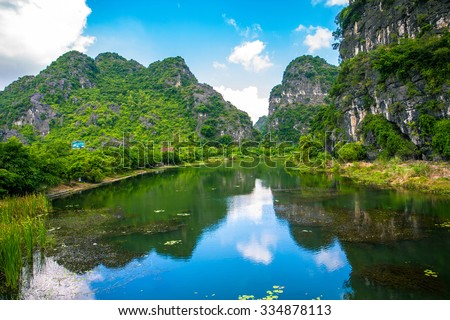 Trang An, Tam Coc, Ninh Binh, Viet nam. It's is UNESCO World Heritage Site, renowned for its boat cave tours. It's Halong Bay on land of Vietnam