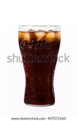 TRIESTE, ITALY - April 14, 2016, Glass of Coca-Cola. Isolated on white Background. Coca Cola, Coke is the most popular carbonated soft drink beverages sold around the world