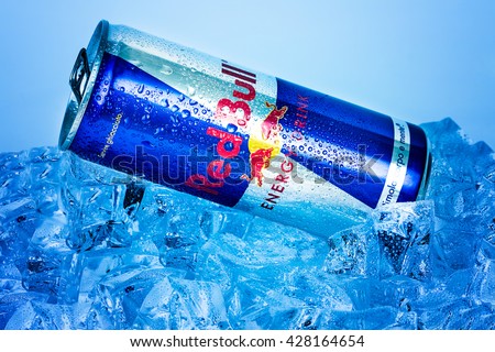TRIESTE, ITALY-MAY 29, 2016: Aluminium can of Red Bull Energy drink on ice.Isolated on white Background.Red Bull is the most popular energy drink in the world, with 5,226 billion cans sold in 2012.