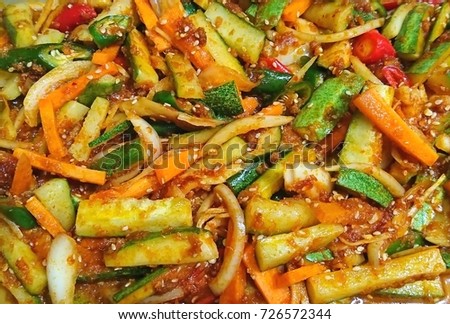 Acar is a kind of vegetable pickle served as condiment for any meals. 