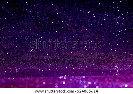 purple abstract background with bokeh defocused lights christmas